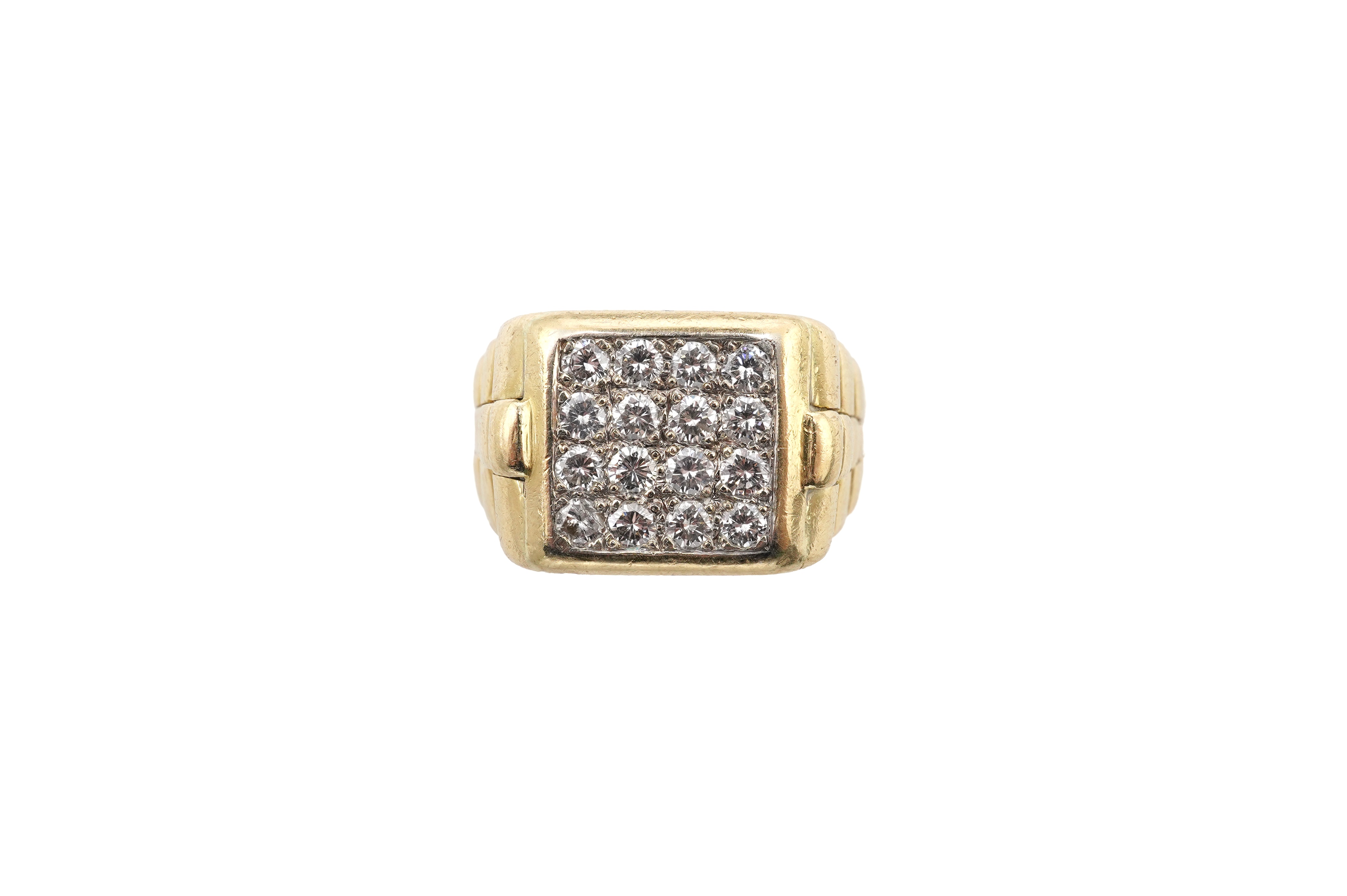 A gold and diamond signet ring